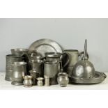 A quantity of pewter: two glass bottom tankards; one with touch marks to the rim, a warming plate,