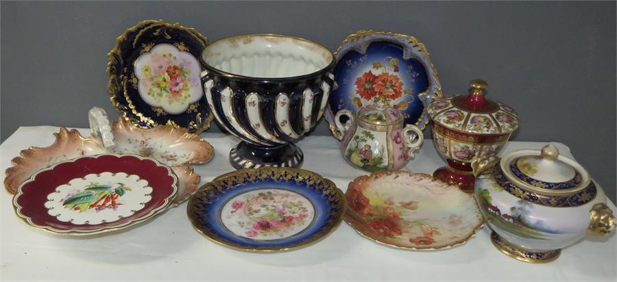 A quantity of ceramics including a Japanese Noritake jar and cover, a Continental jar and cover with