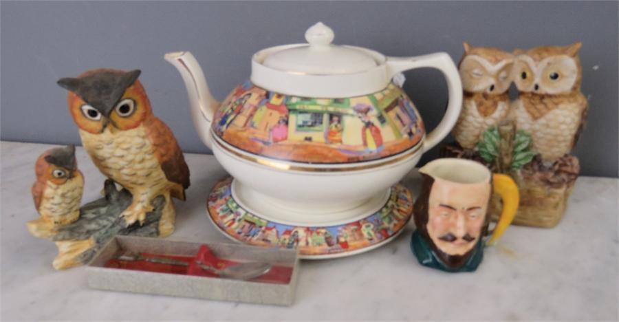 A miscellaneous group of items to include a Crown Ducal tea pot and stand, miniature toby jug,