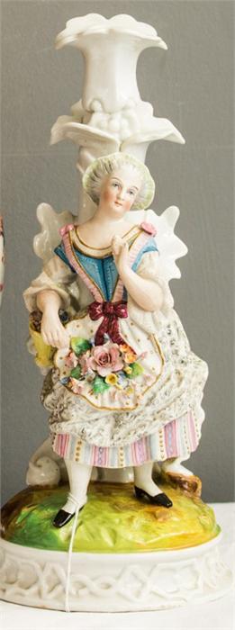 An early 20th century porcelain candlestick circa