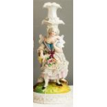 An early 20th century porcelain candlestick circa