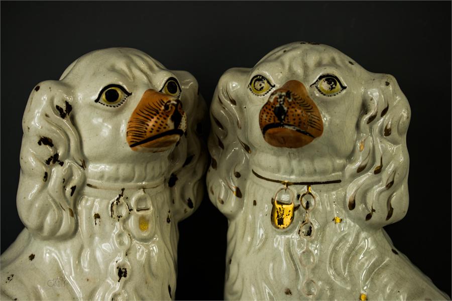 A pair of Staffordshire dogs, with painted detail. - Image 2 of 4