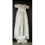 An Edwardian Christening gown in cotton with embroidered detail, and another similar Christening