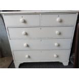 A Victorian white painted chest of drawers with tw