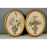 A pair of oval Chinese gouache on pith paper depicting basket urns containing a variety of exotic