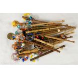 A quantity of turned treen lace makers bobbins wit