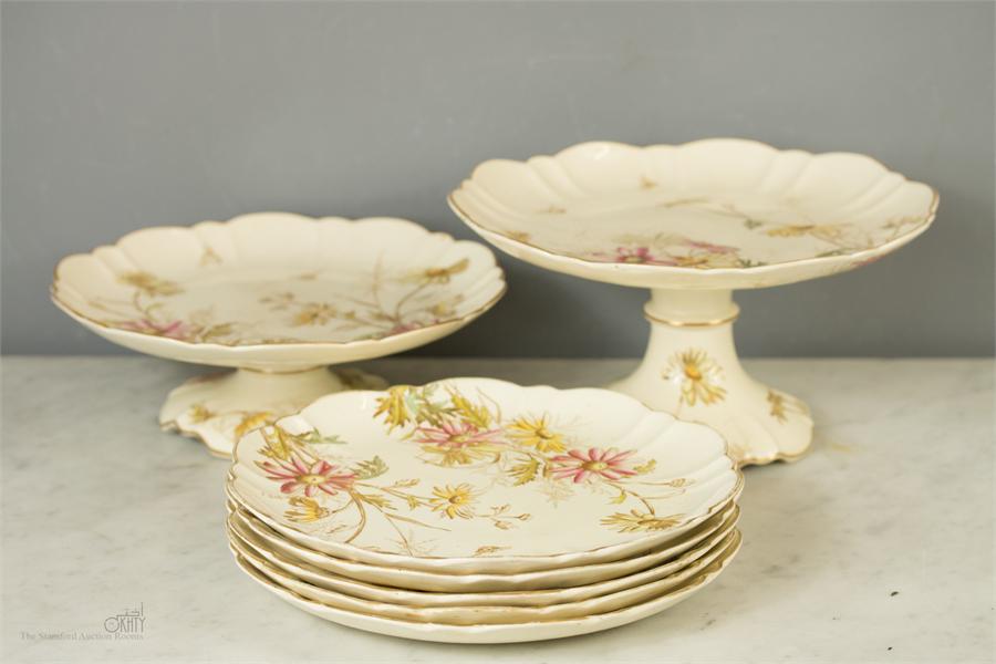 A group of George Jones aesthetic movement dessert ware comprising two comports and five cake