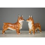 Two Royal Doulton corgi dog figurines, HN2558, 12.5cm high.