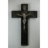 A black marble and cast metal Corpus Christi, 60 by 37cm.