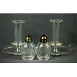 A pair of glass chamber sticks, and a pair of salt and peppers etched with humming birds.