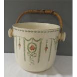 A Royal Doulton slop bucket.