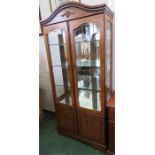 A mahogany glazed cabinet with two glass panelled