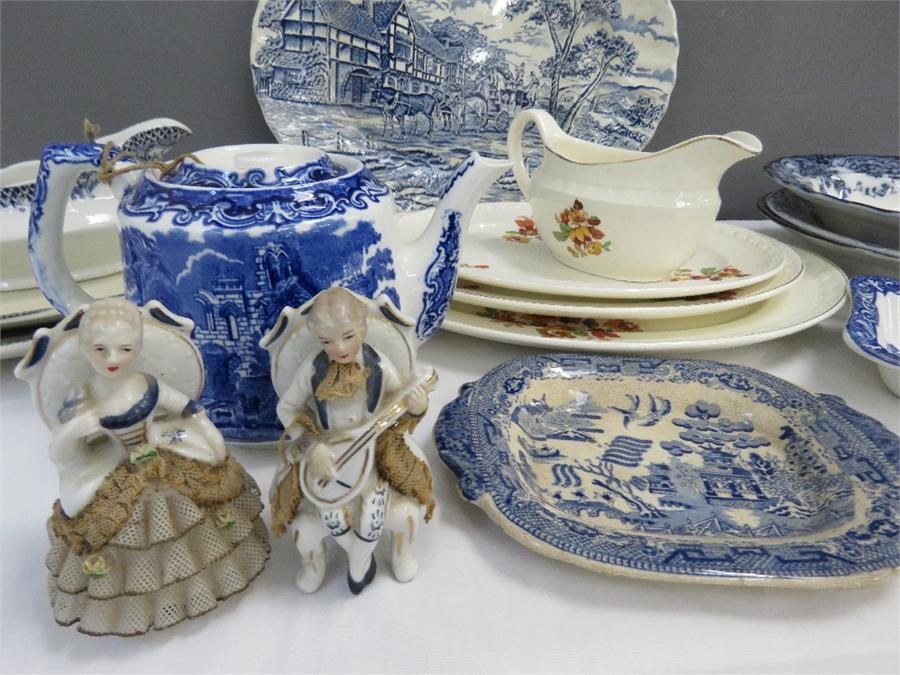 A group of ceramics including oval platters, blue and white tea pot, miniature willow pattern plate, - Image 2 of 30