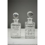 Two lead crystal decanters, both with original stoppers.