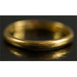 A 22ct gold wedding band, size N, 3.1g.