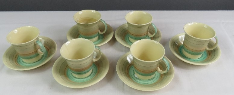 An Art Deco Suzie Cooper set of six coffee cans and saucers. - Image 5 of 48