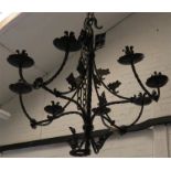 A wrought iron chandelier.