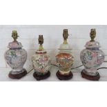 A group of four Chinese style table lamp bases. (lacking shades).