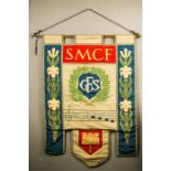 An SMCF embroidered banner.