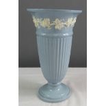 A Wedgwood of Etruria & Barlaston embossed Queensware vase.