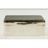 A silver cigarette box, Walker & Hall, Sheffield 1922, cedarwood lined interior, total weight 14.