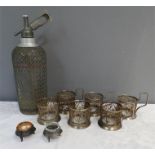 A Syphon together with six silver plated filagree glass holders and two silver plated glass lined