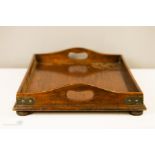 A Naval tray; made from teak from the HMS Glasgow Cruiser, together with an African hide shield.