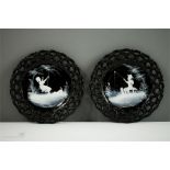 A pair of Mary Gregory style glass plates, hand painted in white enamel to depict a boy fishing