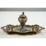 A 19th century gilt bronze champleve inkstand with liner, 22cm wide.