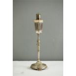An early 20th century silver plated cigarette lighter in the form of a lamp post, and a further