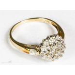 A 9ct gold and diamond cluster ring, size M, 2.1g.