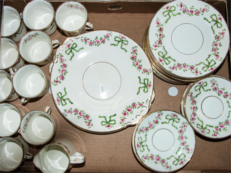 A quantity of teaware in the pink rose pattern, 488 to the base.