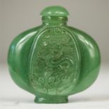 A jade scent bottle carved with decoration.