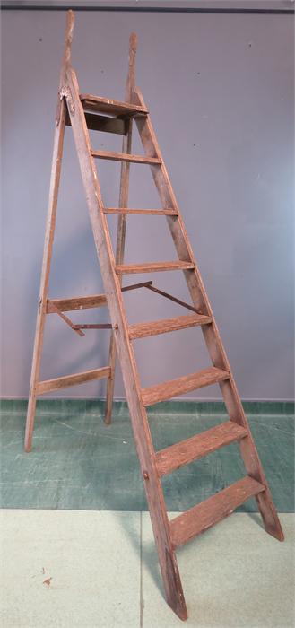 A set of wooden ladders.