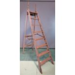 A set of wooden ladders.