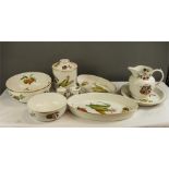 A group of Royal Worcester in the Evesham pattern, to include jug, vegetable dishes, mustard pots,