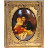 An oval painting depicting mother and child, 39 by 28cm.