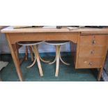 A 1950s light oak government desk.