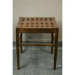 An early 20th century stool, with lattice form top.