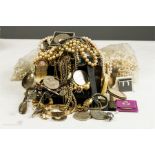 A quantity of costume jewellery including pearl necklaces, watches, brooches pendant, trinkets etc.