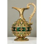 A late 19th/early 20th century silver gilt, enamel, pearl and jade ewer, with relief cast foliate