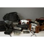 A quantity of cameras including early digital cameras and Gokin filters.