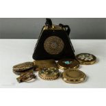 A miscellaneous lot to include compacts, a handbag/compact purse in suede, folding glasses etc.