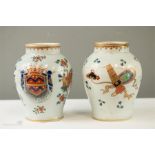 A pair of Chinese porcelain jars bearing coat of arms the bodies.