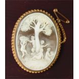 A 9ct gold cameo brooch by Di Luca, the scene of putto inscribed F.Lu Fuilii? the 9ct gold setting