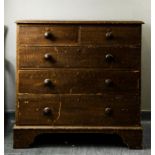 A pine chest of two over three long graduated drawers, with textured paintwork.