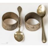 Two silver napkin rings, and two spoons.