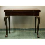 A Fine 19th century Irish mahogany card table with a green baise lined interior, square form counter