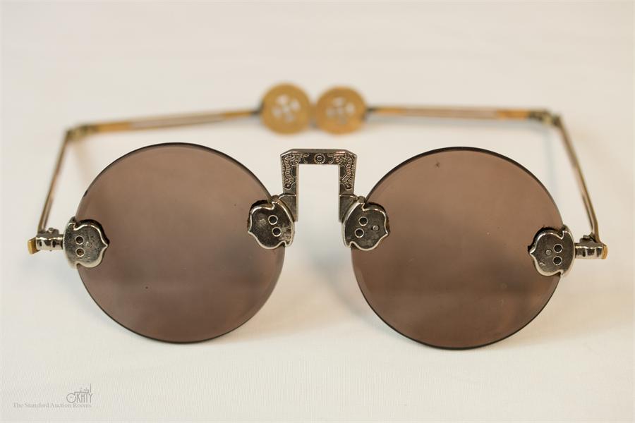 A pair of 19th century Chinese sunglasses.