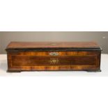 A Victorian rosewood music box, the top inlaid with central motif.